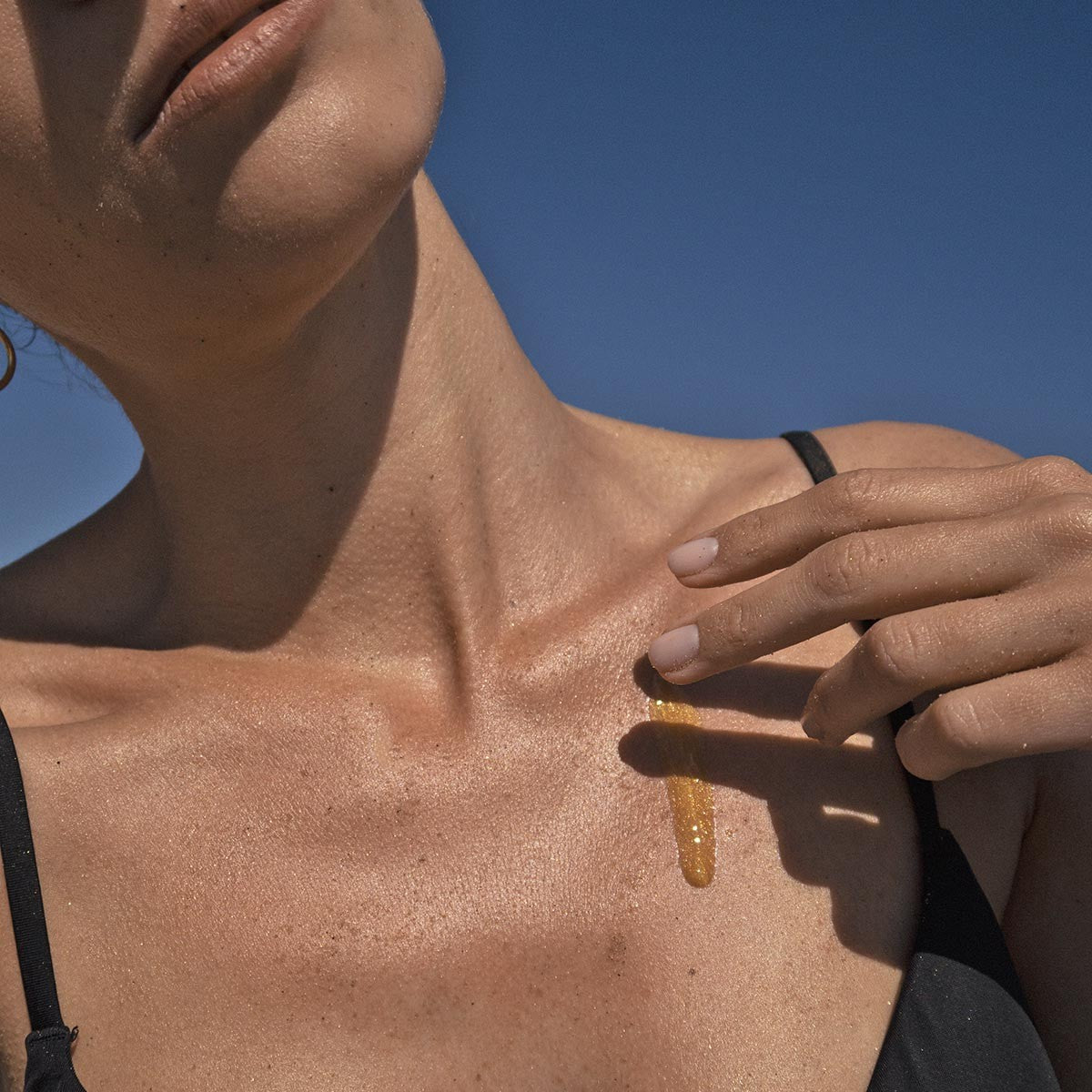 Óleo iluminador para rosto e corpo 